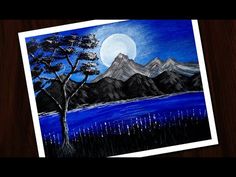 a painting of a tree and mountains with the moon in the sky above it on a wooden table