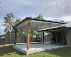 Pergolas and Patio Installation services Fly Over Patio Roof, Extending Roof Over Patio, Add On Carport To House, Flyover Patio Roofs, Flat Roof Patio, Covered Driveway, Deck Covering, Modern Outdoor Living Area, Patio Roof Extension Ideas