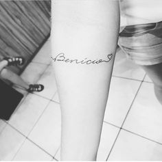 a woman's leg with the word benice written in cursive font