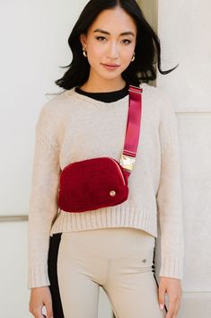 A chill in the air calls for cozy accessories. Enter: The Aspen Sherpa Belt Bag. With its soft fleece material, adjustable strap (intended to fit over sweaters, vests, and coats), and glam gold hardware, you're sure to be reaching for this fanny pack all Fall and Winter season long.Details:5.5" long x 8.5" wide x 2.25" deepBack zippered pocket is 6.5" wide x 4" long (fits a phone!)Strap adjusts from 21"-39"3 interior mesh pocketsMetal gold clasp and hardware Sherpa Belt Bag, Activewear Lululemon, Fall Athleisure, Fall Activewear, Cozy Accessories, Cardigan Sweater Coat, Pullover Cardigan, Phone Strap, Denim Accessories