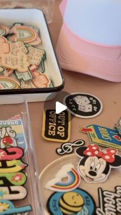 mickey mouse stickers are sitting on a table