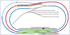 an image of a train track with multiple colors and lines on it, including red, green, blue, and yellow