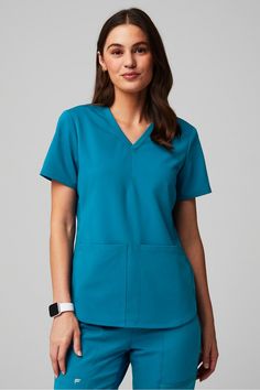 Method Scrub Top Fabletics Caribbean Blue female Activewear >> Scrubs >> Tops >> Product Feed regular Nurse Scrubs, Blue Scrubs, Scrubs Nursing, Womens Scrubs, Medical Scrubs, Massage Therapist, Scrub Pants, Model Fits, Scrub Tops