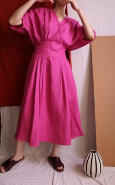 Details Linen faux-wrap dress with basque waist (semi-elasticated). No lining.Made-to-order. Ship in 15-18 days.  Color/Couleur: Raspberry Pink( Please convo us for more colour options.) Material:100% linen  Size/Taille:  Made-to-measure. Please provide bust/waist/hips size and height during checkout.  Length:115cm  Model is 163 cm/ 47kg with 33' bust/ 25' waist/35'  hips.  Care instructions/Entretien:Cold handwash and air-dry. Do not soak. Follow us on instagram (@metaformose) for all the lates Summer Dresses With Pleated Sleeves In Relaxed Fit, Summer Dresses With Pleated Sleeves And Relaxed Fit, Spring Linen Pleated Dress, Knee-length Box Pleat Pleated Summer Dress, Chic Summer Midi Dress With Box Pleat, Summer Knee-length Box Pleat Pleated Dress, Summer Box Pleat Midi Pleated Dress, Summer Midi Length Box Pleat Dress, Summer Box Pleated Midi Dress