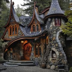 a house made out of rocks and trees