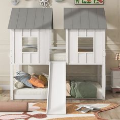 two children's bunk beds with grey roof tops