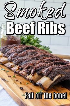 grilled beef ribs on a cutting board with text overlay that reads smoked beef ribs fall off the bone