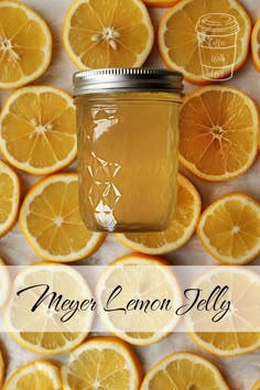 mason jar filled with lemon jelly surrounded by sliced oranges and the words never lemon jelly