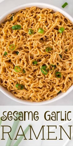 sesame garlic ramen in a white bowl with chopsticks and green onions on the side