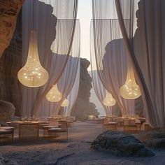 the interior of a desert restaurant with sheer curtains and round tables set up for dinner