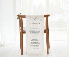 a chair with a wedding program on it