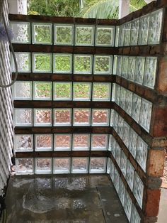 the inside of a building with glass blocks on it's walls and flooring