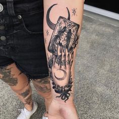 a person with a tattoo on their arm