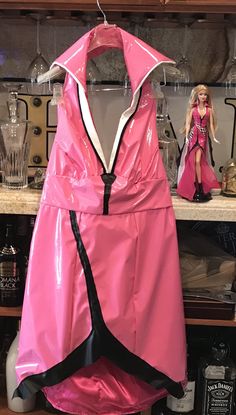 Making the adult pink corvette Barbie costume. Rain Jacket