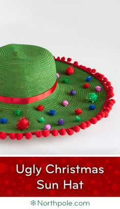 an ugly christmas sun hat with pom - poms