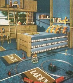 this is an old photo of a bedroom with train tracks and toys on the floor