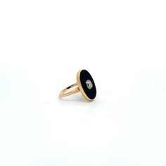 This unique 14k yellow gold ring showcases a one-of-a-kind onyx stone and diamond, perfect for a size 6 fit. Diamond Enamel Ring With Black Enamel, Fine Jewelry Black Enamel Round Ring, Fine Jewelry Black Enamel Ring, Oval Diamond Jewelry With Black Enamel, Timeless Onyx Gemstone Rings, Oval Black Enamel Diamond Jewelry, Elegant Oval Black Enamel Ring, Timeless Onyx Rings For Anniversary, Round Black Enamel Diamond Jewelry