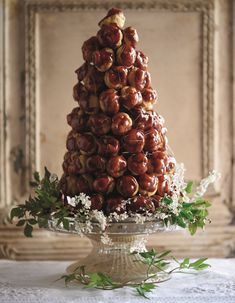 a christmas tree made out of chocolate covered donuts