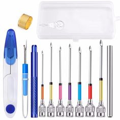 an assortment of different tools including pens, needles and threading tips are shown in this image