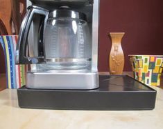 a coffee maker sitting on top of a counter