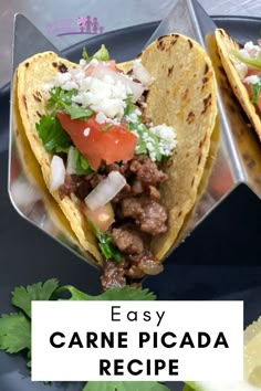 two tacos on a plate with the words easy carne picada recipe