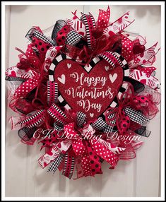 a valentine's day wreath on the front door