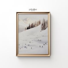 a framed photograph of people skiing on a snowy mountain