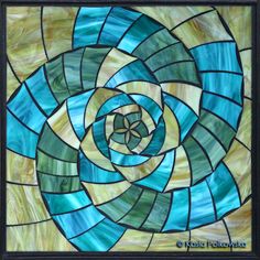 a stained glass window with an abstract design