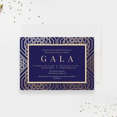 a blue and gold wedding card with the word gala on it, surrounded by confetti