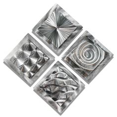 four square metal artwork pieces on a white background