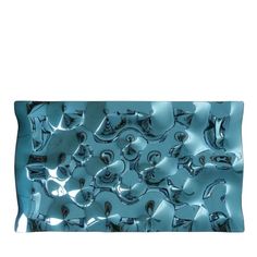 an image of a shiny blue bag with skulls on the front and bottom side,