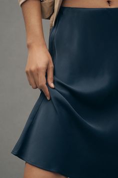 If you haven't met the Tilda slip skirt, then bon jour! A French-inspired bias-cut design makes it drape and move just so ��– equally chic for a night out or a day about town. | The Tilda Knee-Length Slip Skirt by Anthropologie in Blue, Women's, Size: Medium, Viscose Above Knee Skirt, Knee Skirt, Flamboyant Natural, Knee Skirts, Work Fits, Cold Weather Fashion, Slip Skirt, Fashion App, Midi Skirts