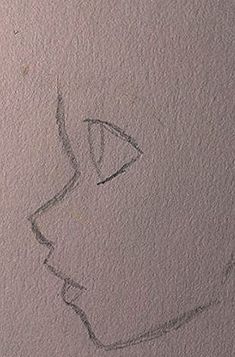 a drawing of a woman's face on the wall