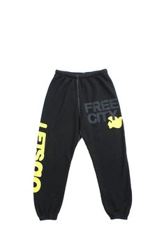 Unisex sweatpant with classic "Free City" print in black and yellow. A supersoft essential sweatpant with a covered elastic waist and a pull drawstring. WHY WE LOVE IT FREECITY, born in 2001, uses local factories with custom developed materials, fabrications, washes and dyes. Prints are hand-thrown, using hand-mixed paint with on-screen mixed gradients - made one by one, in small batches. DETAILS Medium weight polyblend: 50& rayon, 25% polyester, 25% cotton. Hand-sewn, washed, and hand-screen pr Free City Sweatpants, Sweatpants Design, Graphic Sweatpants, Christmas Haul, Free City, Knit Shoes, City Print, Swag Outfits For Girls, Black Sweatpants