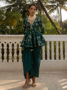 Step into refined elegance with this peplum set, showcasing our signature jaal pattern on luxurious jacquard fabric. Paired with a draped skirt, the peplum top is adorned with intricate handwork laces, creating a chic and sophisticated ensemble. Skirt With Peplum Top, Peplum Kurti, 1950’s Fashion, Style Kurti, Peplum Skirt, Green Fits, Draped Skirt, Peplum Styles, Skirt For Women