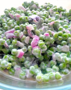 a bowl filled with green and pink food