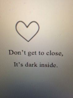 a sign that says don't get to close, it's dark inside