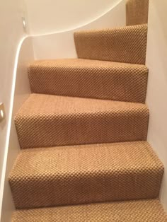 a close up view of some carpeted stairs