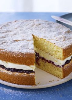 a cake that is cut in half on a plate