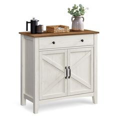 a white cabinet with two doors and a wooden top