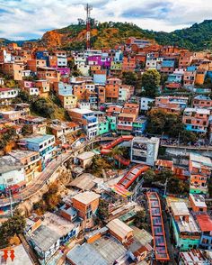 an aerial view of a city with lots of buildings