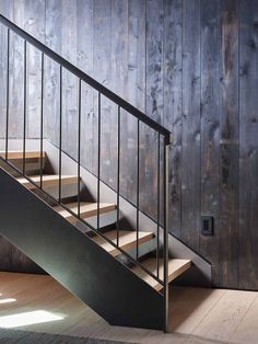 the stairs are made of metal and wood