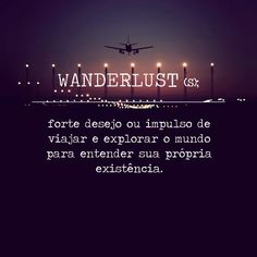 the words wanderlust are lit up at night with an airplane in the background