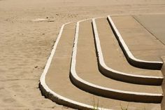 steps made out of sand on the beach