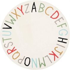 a white plate with colorful letters and numbers on the front, in different colors that spell out words