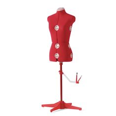 a red mannequin is standing on a stand