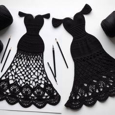 crocheted black dresses are being worked on