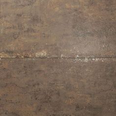 an old, worn and stained concrete surface