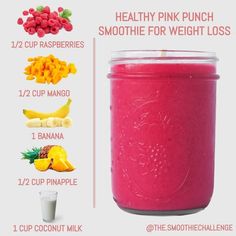 a pink smoothie in a jar with ingredients to make it