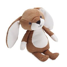 a brown and white stuffed animal on a white background